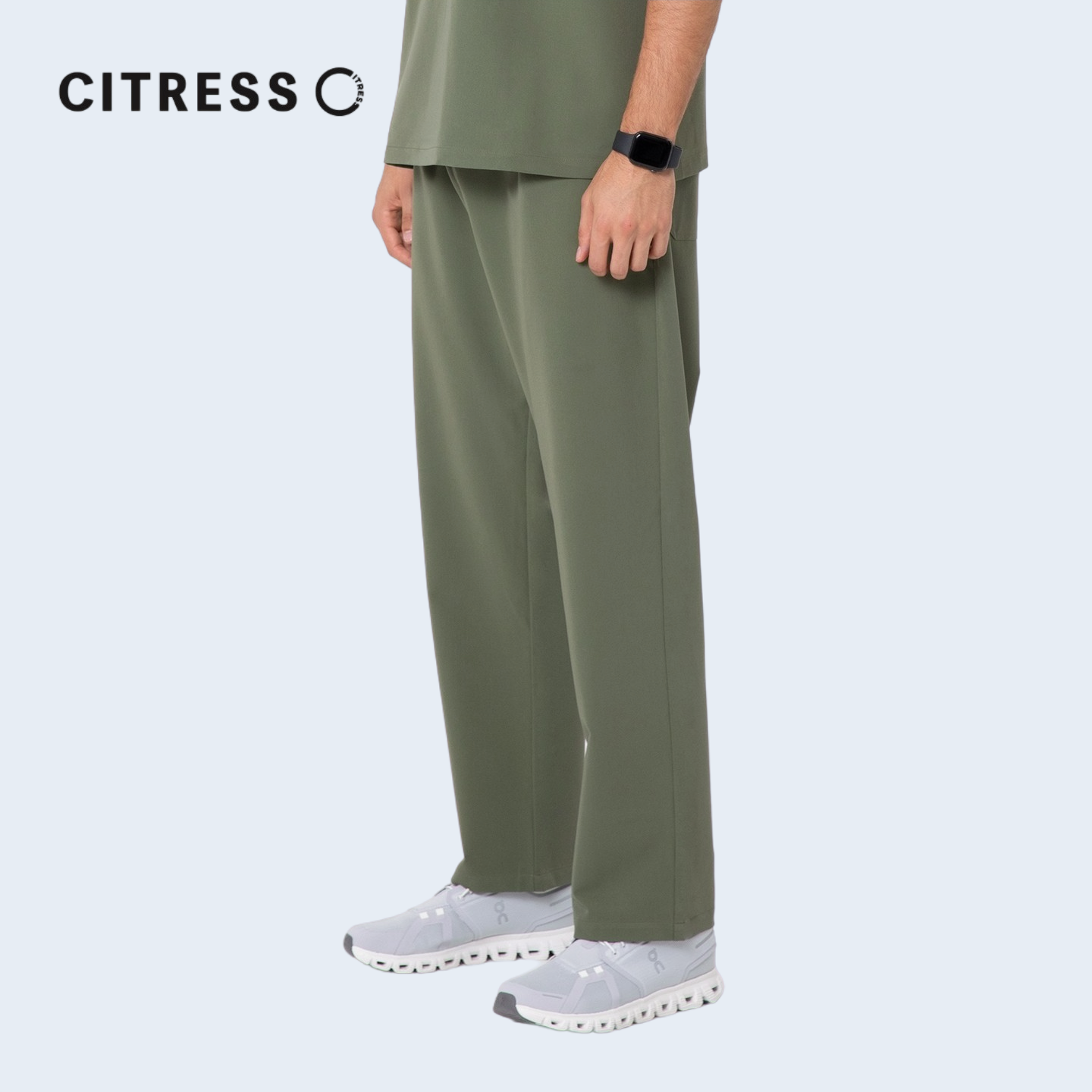 Side view of CITRESS men's green scrub pants, comfortable fit for long medical shifts
