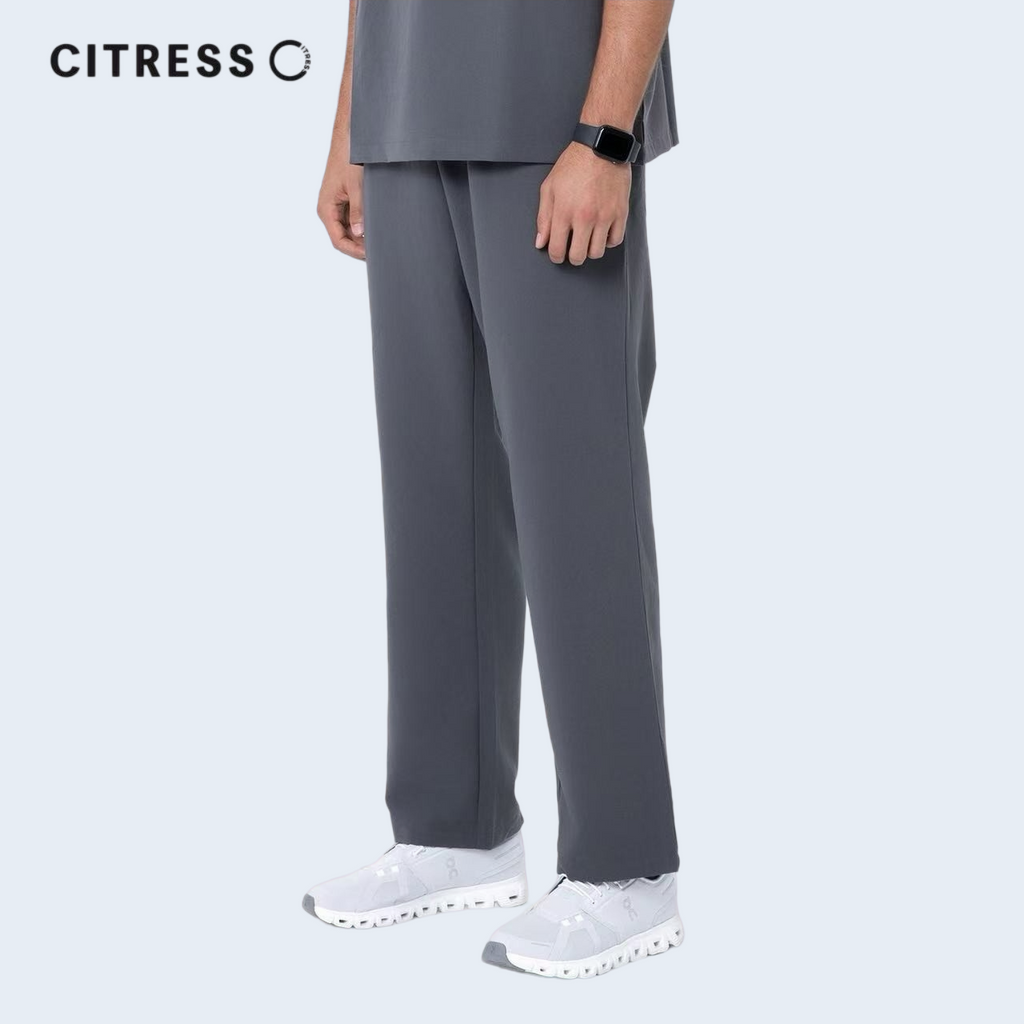 Side view of CITRESS men's grey scrub pants, comfortable fit for long medical shifts