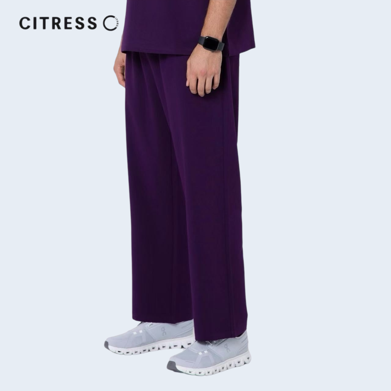 Side view of CITRESS men's purple scrub pants, comfortable fit for long medical shifts