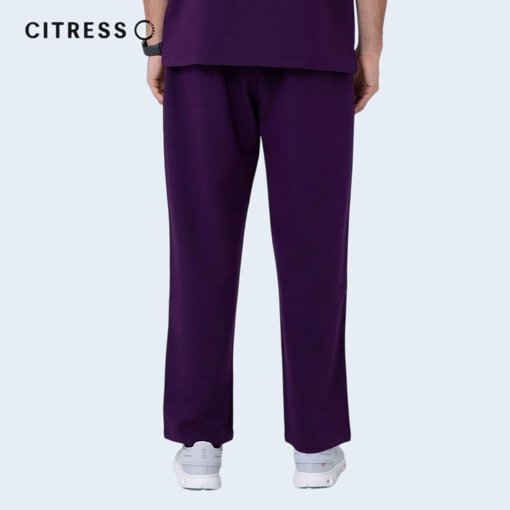 Waist and leg detail of CITRESS purple scrub pants, with functional pockets