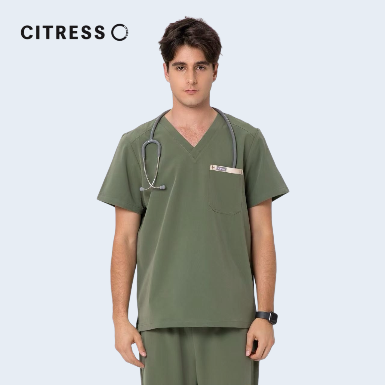 Front view of CITRESS green scrub top, showing V-neck and chest pocket