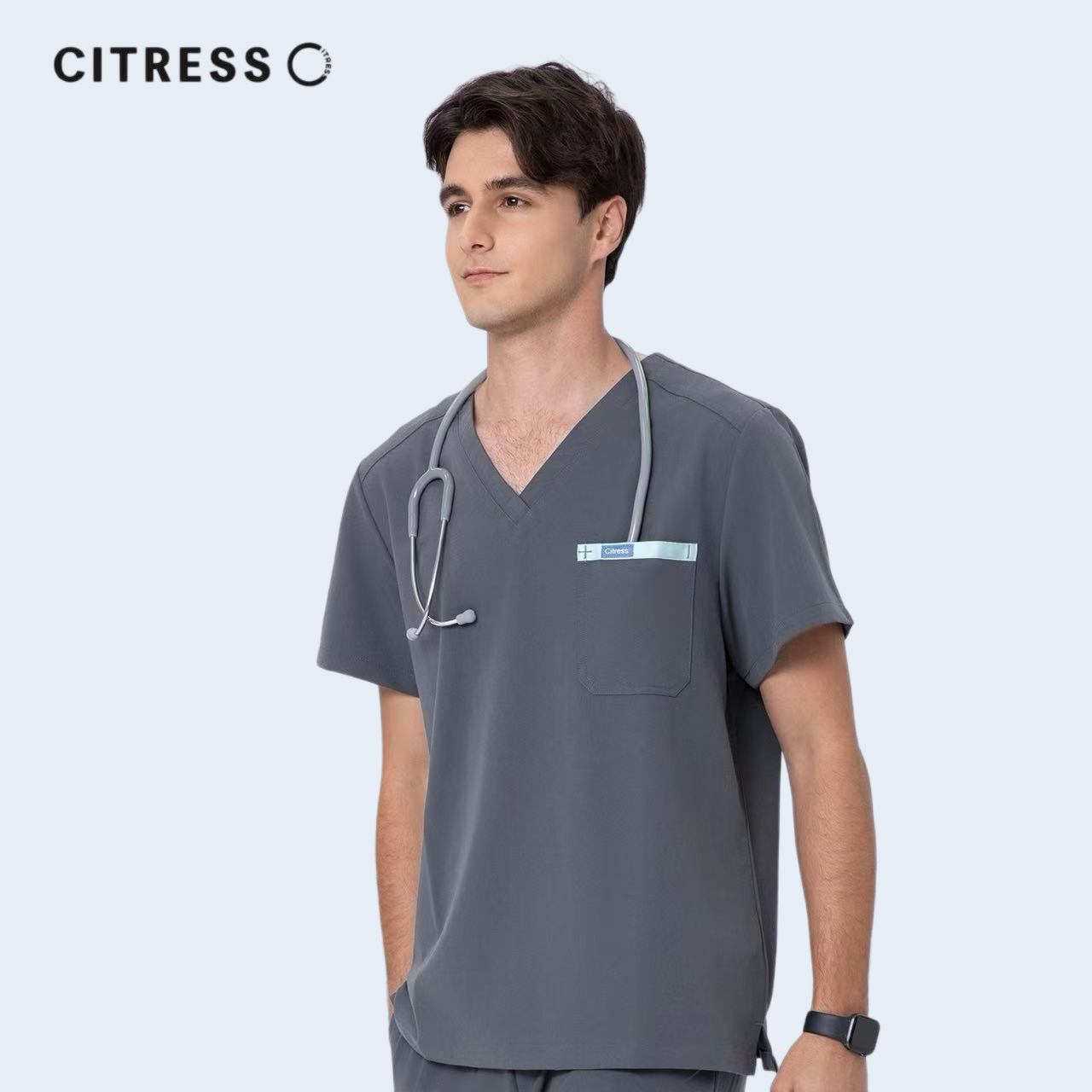 Front view of CITRESS men's grey scrub top, showing V-neck and functional chest pocket