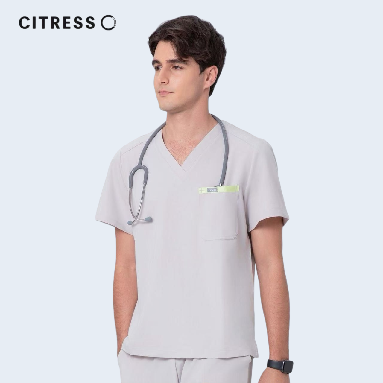 Front view of CITRESS men's khaki scrub top, showing V-neck and functional chest pocket