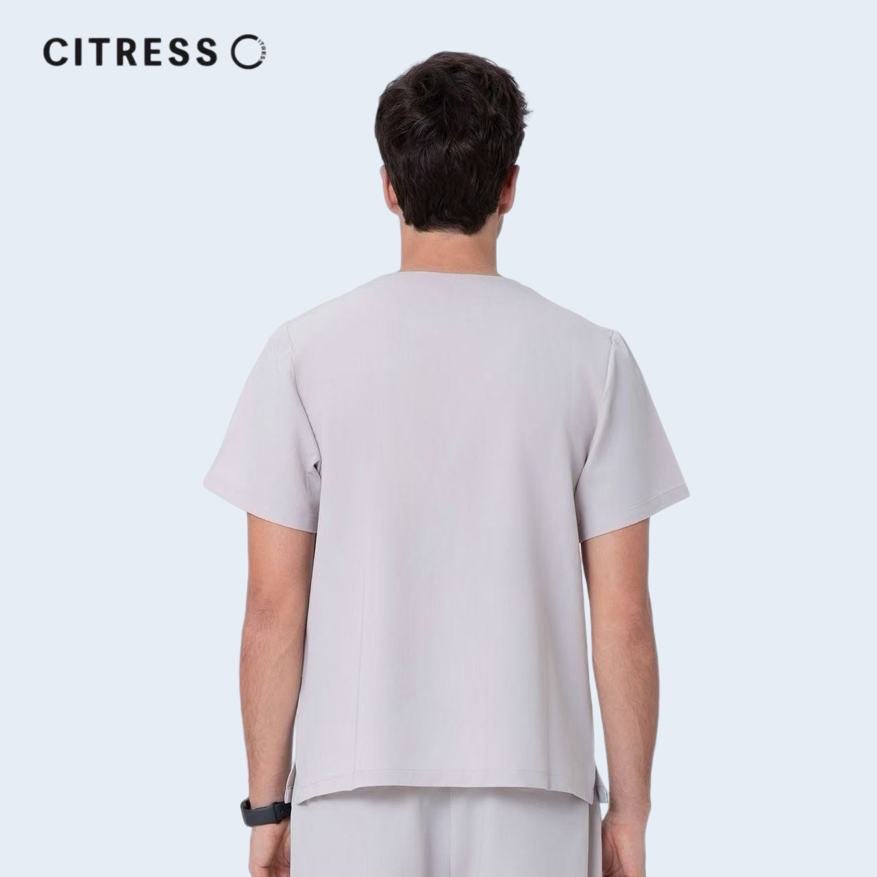 Back view of CITRESS men's khaki scrub top, comfortable fit for long medical shifts
