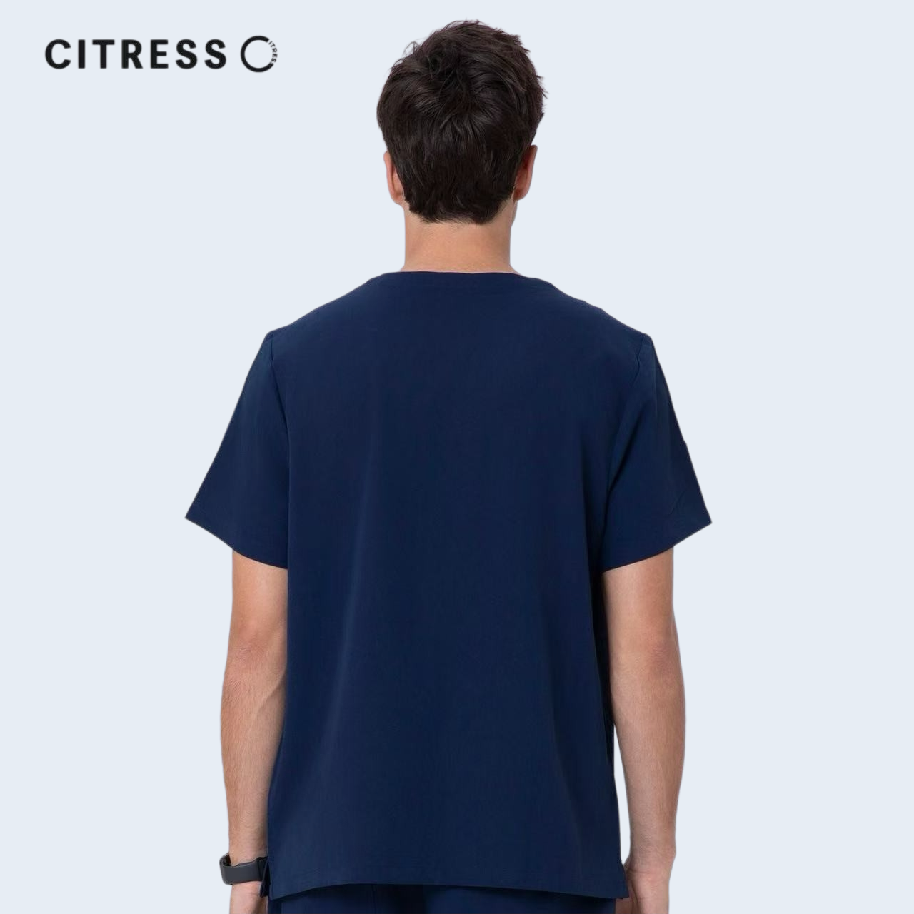 Back view of CITRESS men's navy scrub top, comfortable fit for long medical shifts