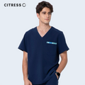 Side view of CITRESS men's navy scrub top, soft stretch fabric