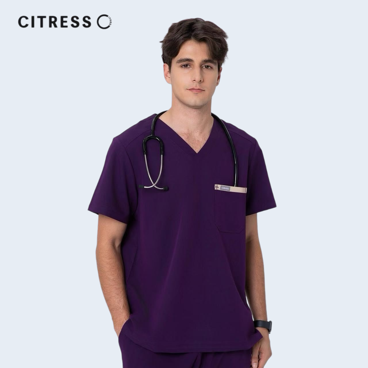 Front view of CITRESS men's purple scrub top, showing V-neck and functional chest pocket