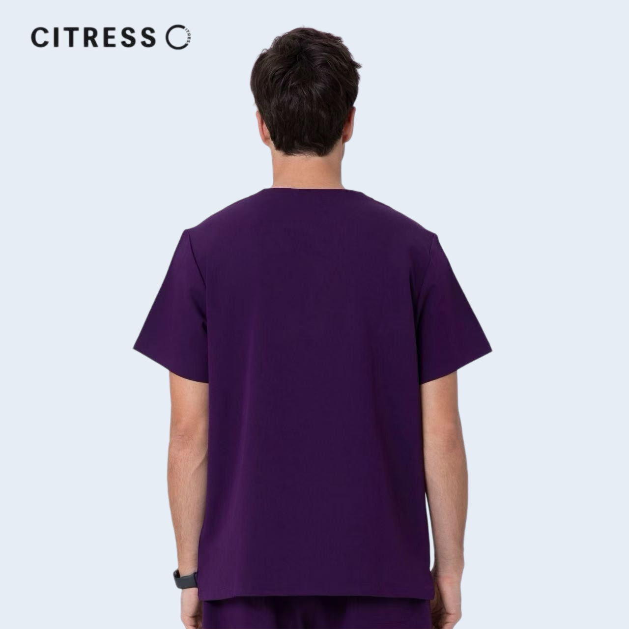 Back view of CITRESS men's purple scrub top, comfortable fit for long medical shifts