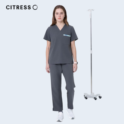 Nurse wearing CITRESS grey scrub pants in hospital, professional medical workwear