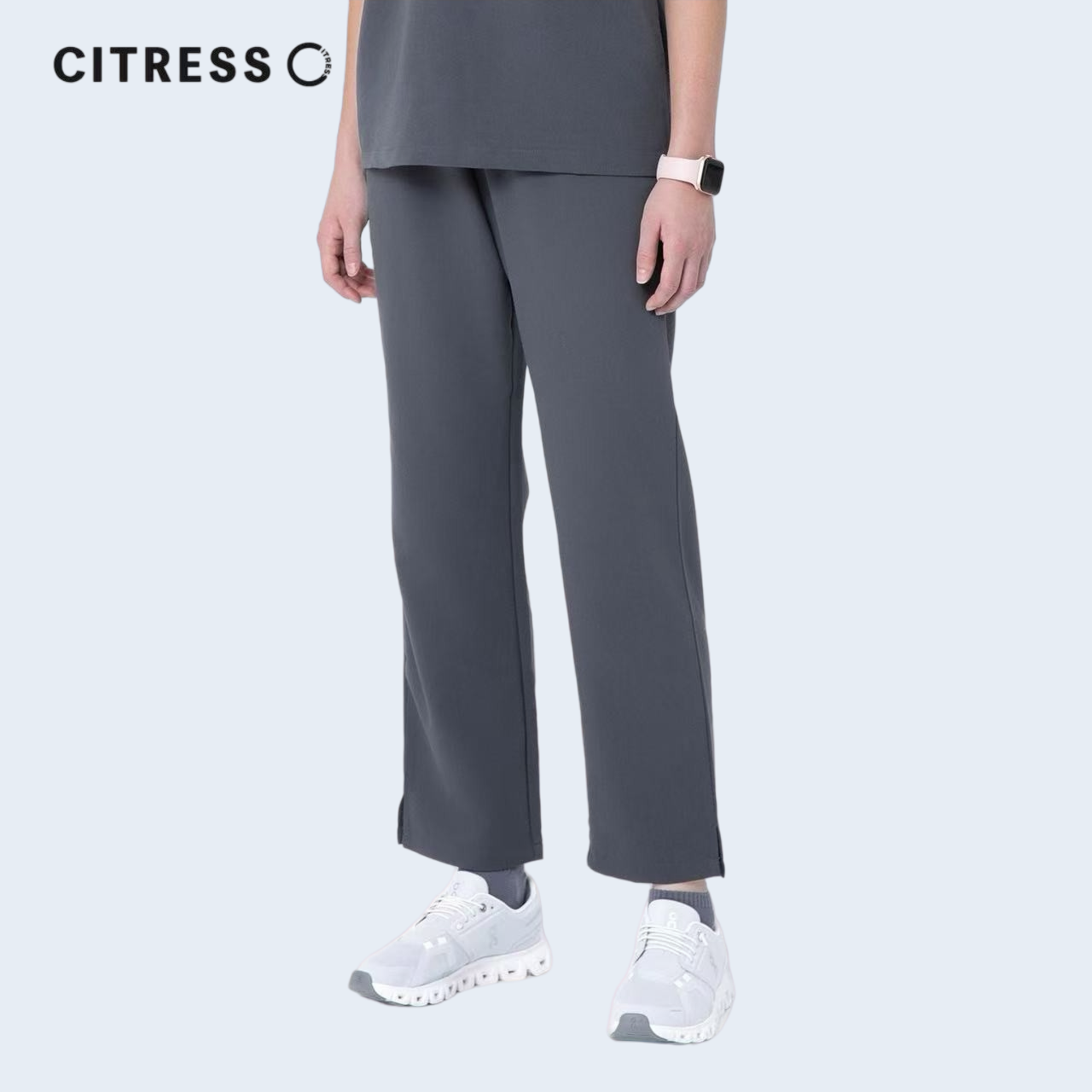 Side view of CITRESS grey scrub pants, showing straight leg fit and drawstring waist