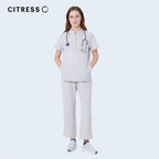 Nurse wearing CITRESS khaki scrub pants in hospital, professional medical workwear