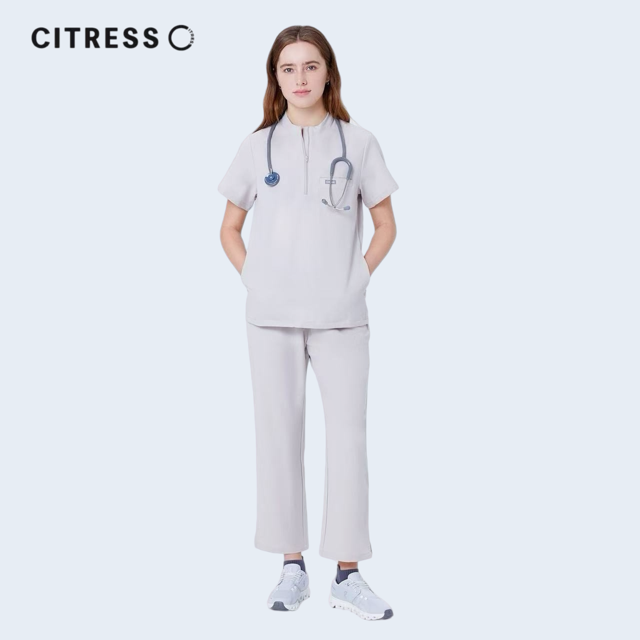 Nurse wearing CITRESS khaki scrub pants in hospital, professional medical workwear