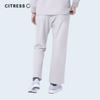 Waist and leg detail of CITRESS khaki scrub pants, with functional pockets