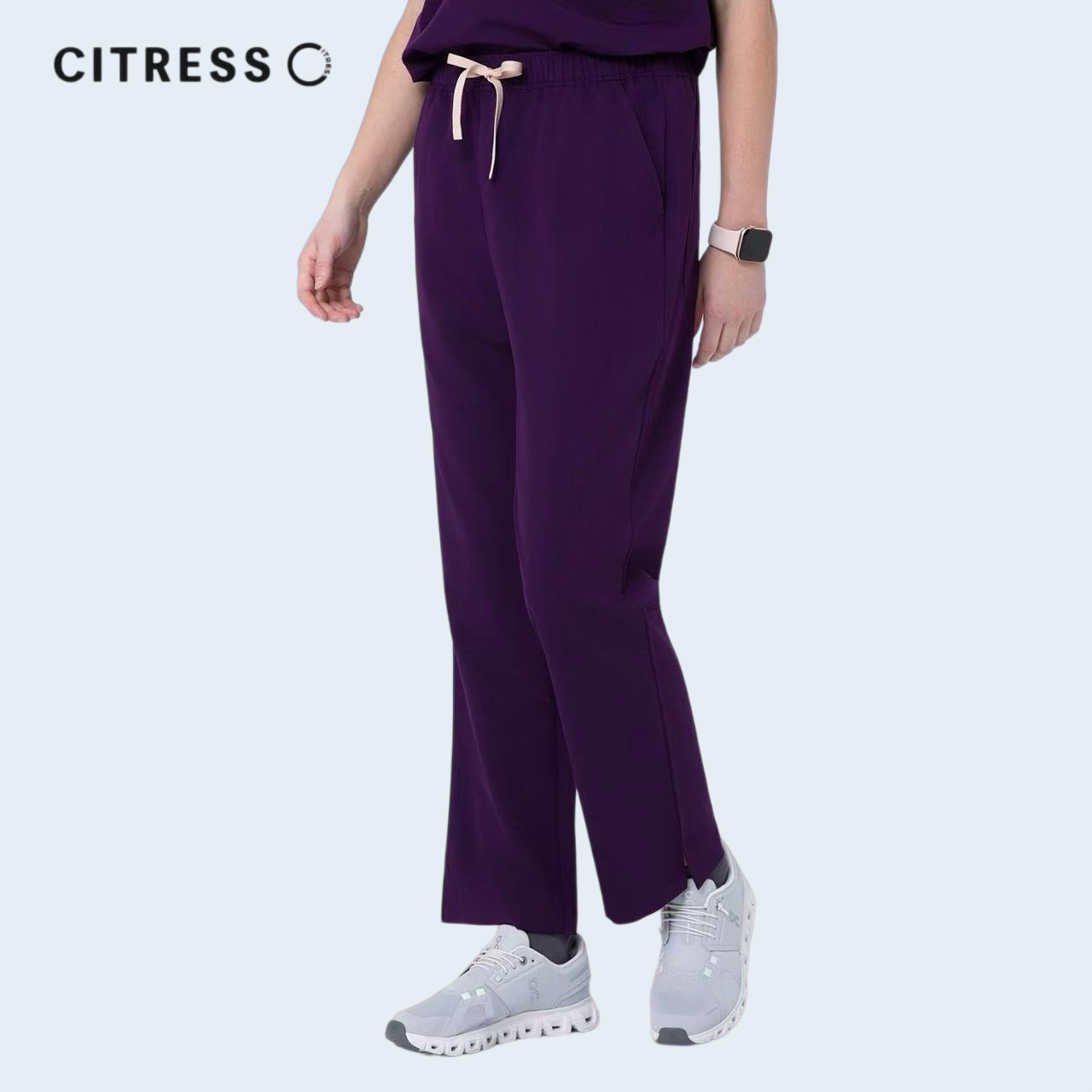 Front view of CITRESS women's purple scrub pants, adjustable waistband for comfort