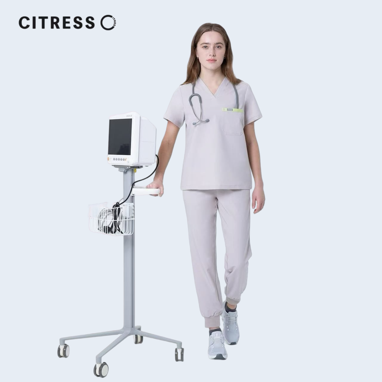 Nurse wearing CITRESS khaki scrub set in hospital, professional medical workwear