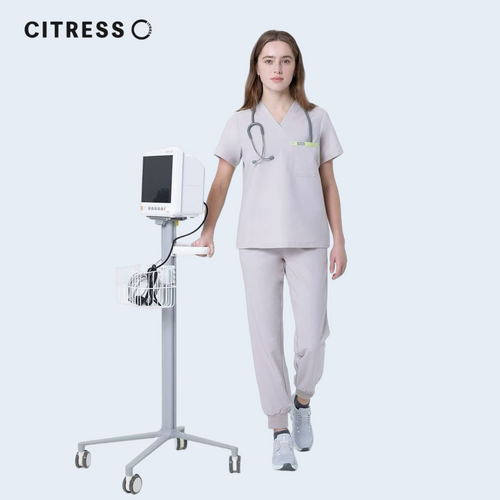 Nurse wearing CITRESS khaki scrub set in hospital, professional medical workwear