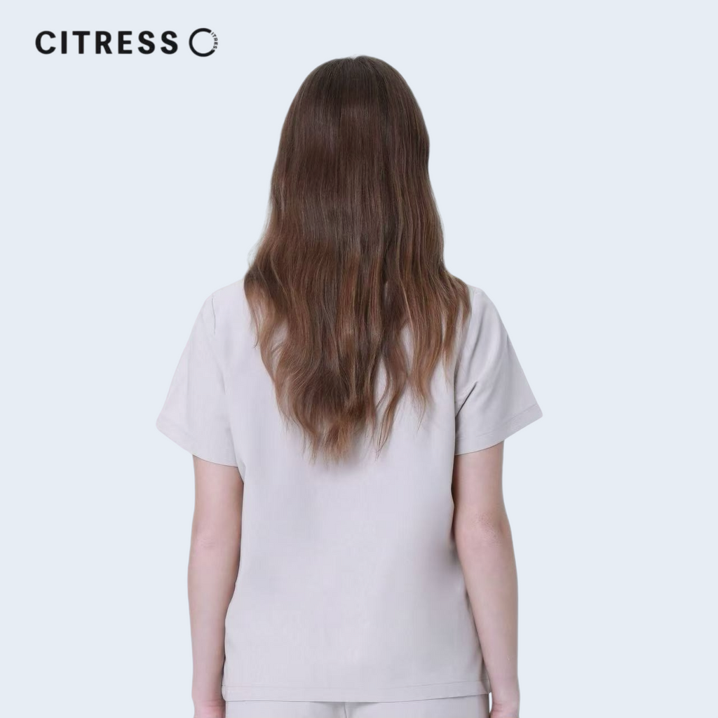Back view of CITRESS khaki scrub top, comfortable fit for long medical shifts