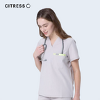 Side view of CITRESS women's khaki scrub top, soft stretch fabric
