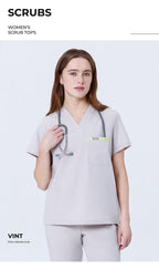 CITRESS khaki scrub top product shot, front view with clean background
