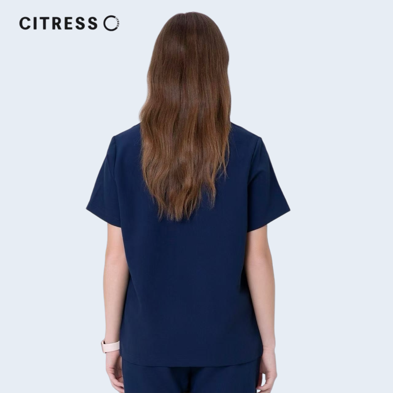 Back view of CITRESS navy scrub top, comfortable fit for long medical shifts
