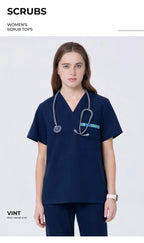 CITRESS navy scrub top product shot, front view with clean background