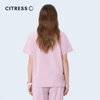 Back view of CITRESS pink scrub set, comfortable fit for long medical shifts