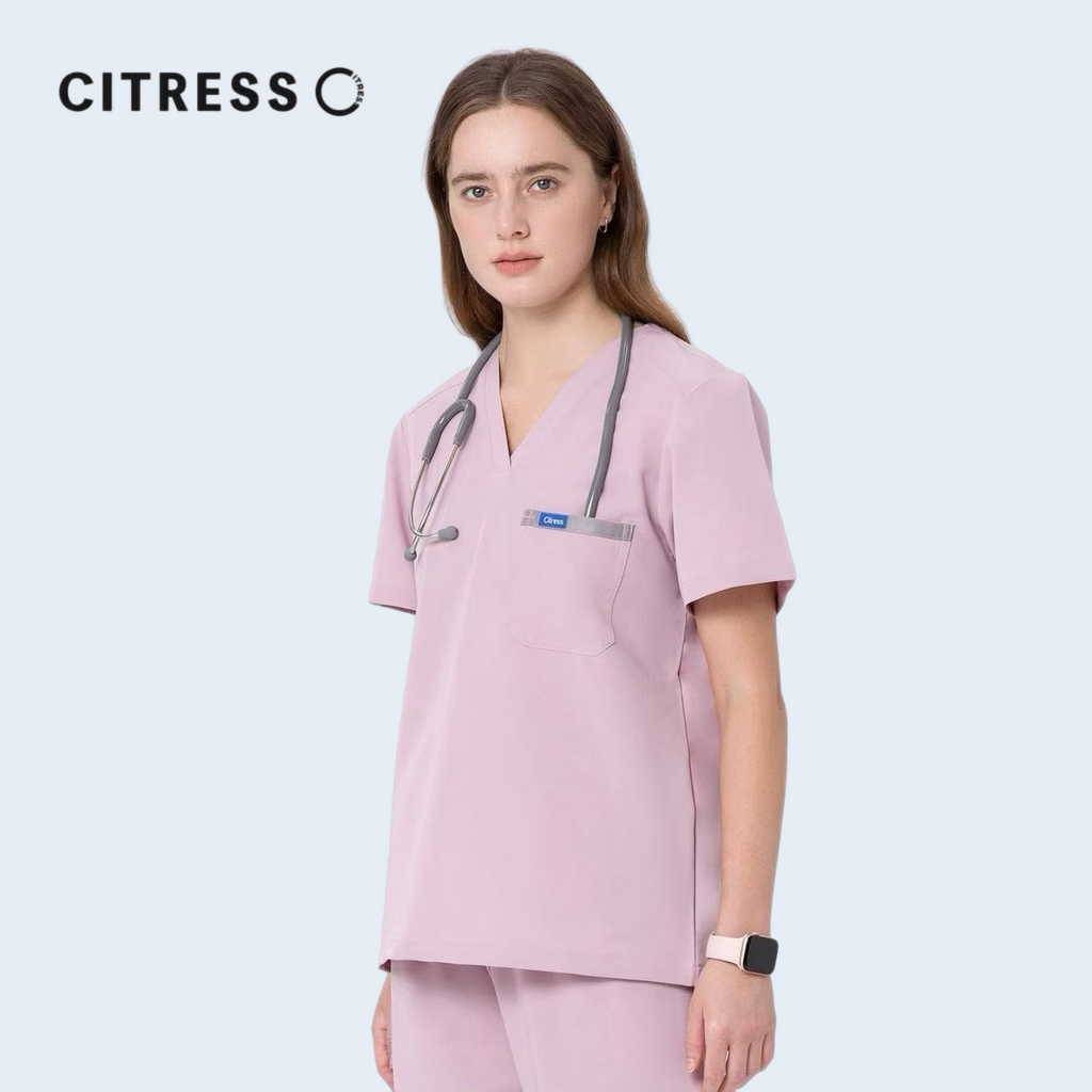 Side view of CITRESS women's pink scrub top, soft antibacterial fabric