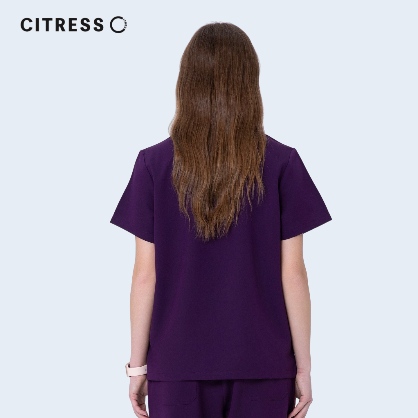 Back view of CITRESS purple scrub top, comfortable fit for long medical shifts
